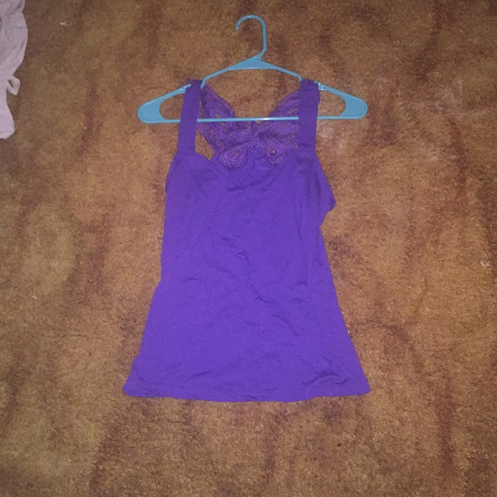 A tank top with a butterfly bank to it